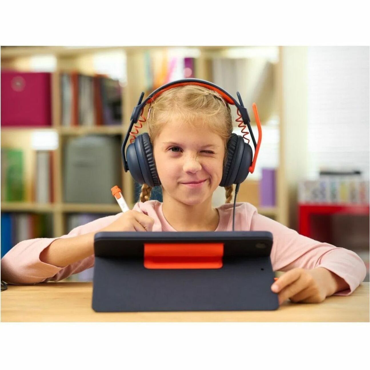 Student using Logitech Zone Learn headset with tablet for digital learning-alternate-image5