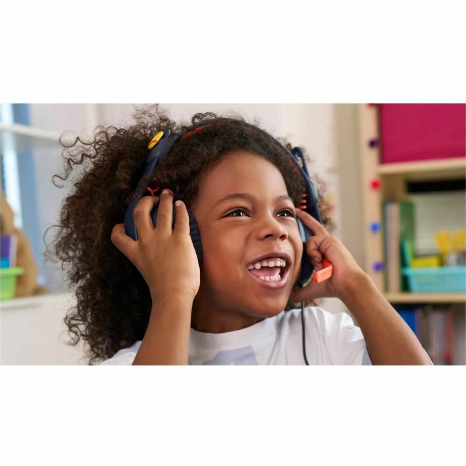 Happy student enjoying learning with Logitech Zone Learn headset-alternate-image7