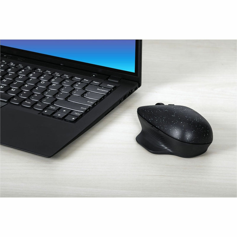 Targus ErgoFlip Mouse in workspace setting with laptop and keyboard