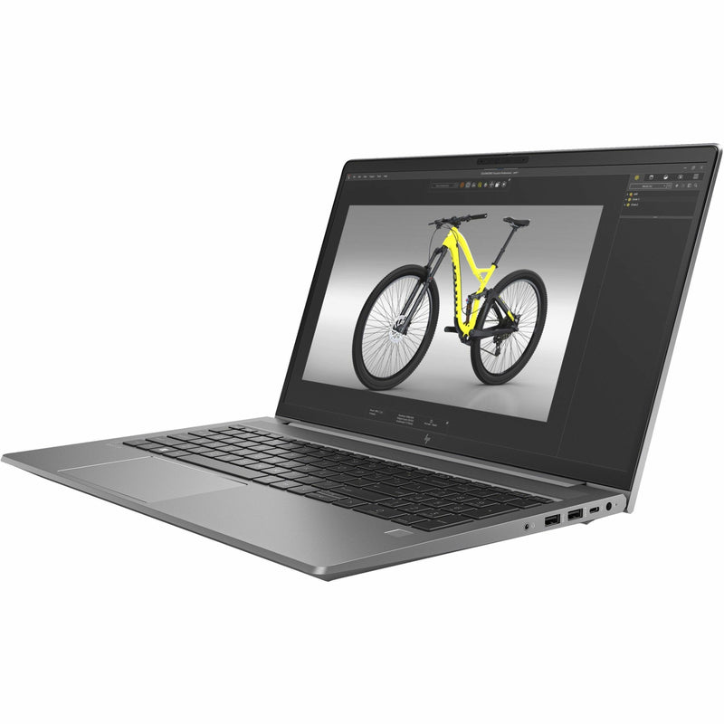 HP ZBook Power G10 laptop displaying 3D rendered yellow mountain bike on screen