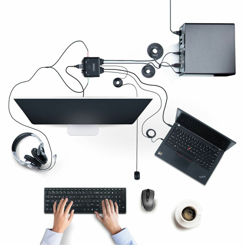 Overhead view of complete workspace setup with StarTech.com KVM switch connecting multiple devices