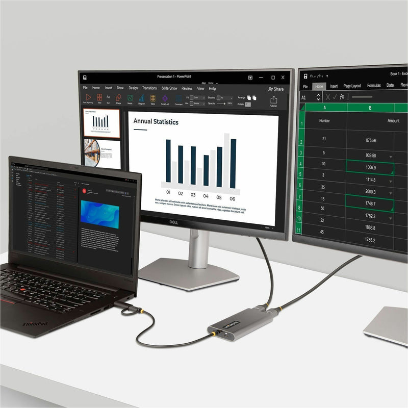 Professional workspace setup showing dual monitors with productivity applications