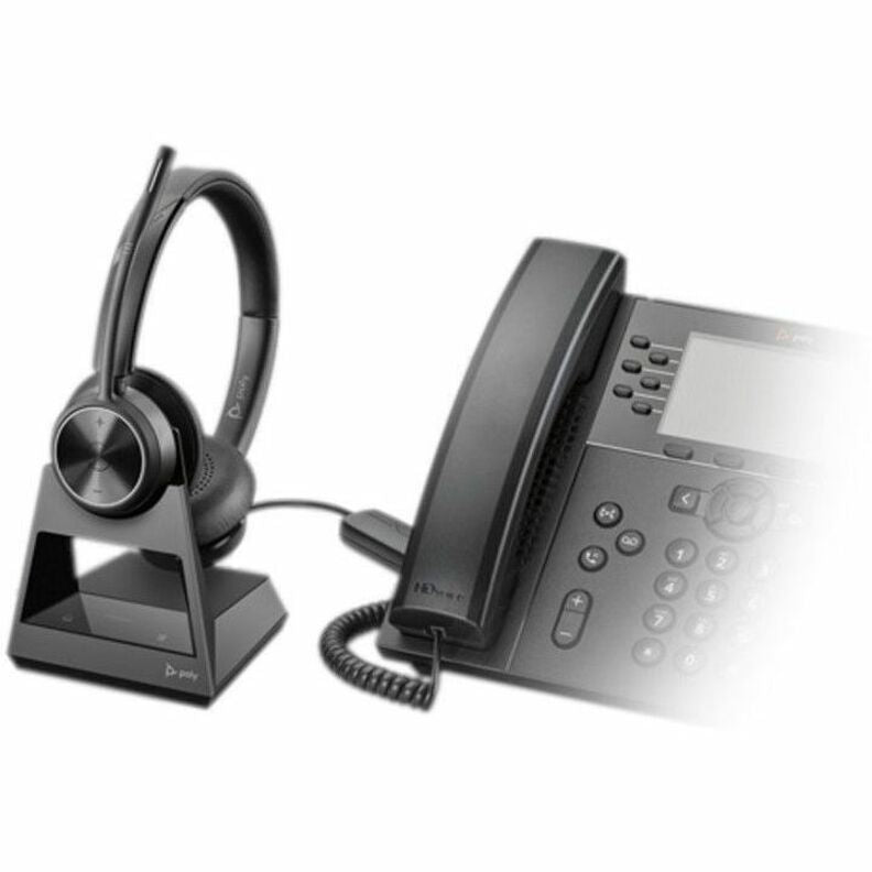 Poly Savi 7300 Office headset with charging stand connected to office desk phone showing workplace integration-alternate-image3