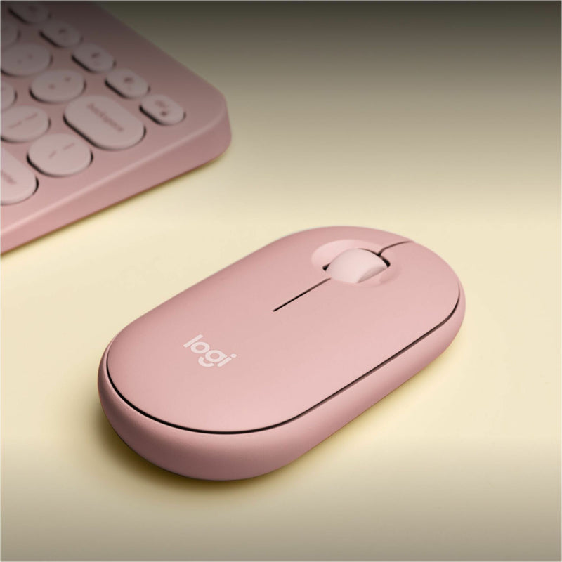 Logitech Pebble 2 M350s mouse in Tonal Rose shown at an angle with keyboard in background