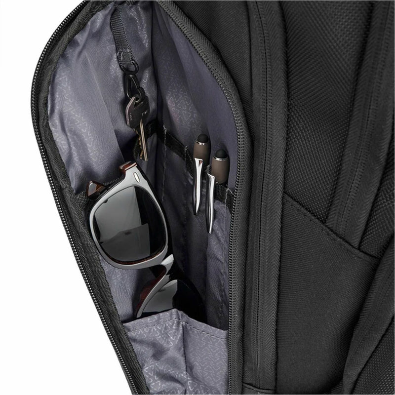 Close-up of quick-access pocket with sunglasses and keys