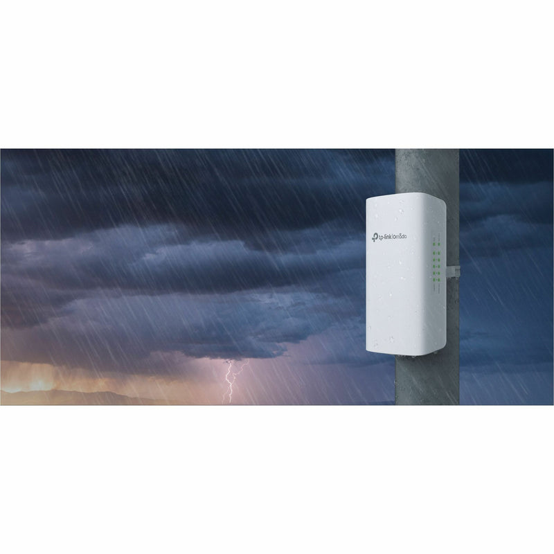 TP-Link switch mounted outdoors during stormy weather showing weather resistance