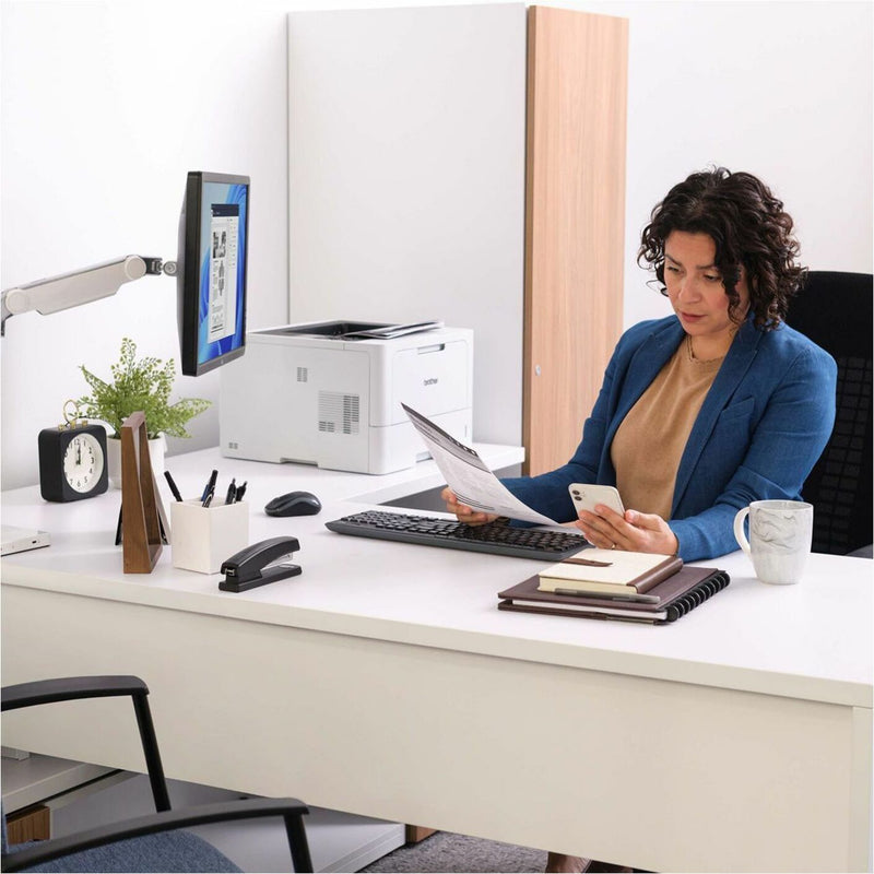 Brother printer in modern office desk setup