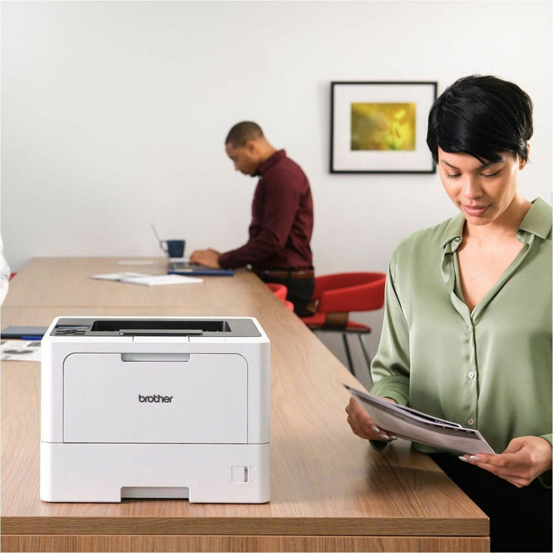 Brother HL-L5210DW in office setting with workers