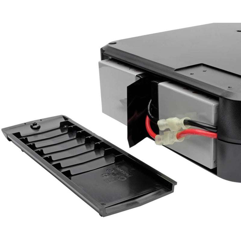 Battery access panel of SMART1200LCD UPS showing hot-swap capability