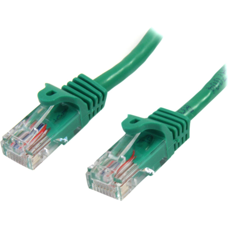 Close-up view of green Cat5e cable RJ45 connectors showing gold-plated contacts and snagless boot design